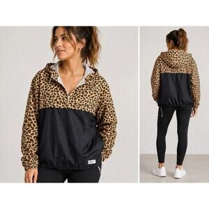 Adidas Originals hooded windbreaker jacket in women’s size Large